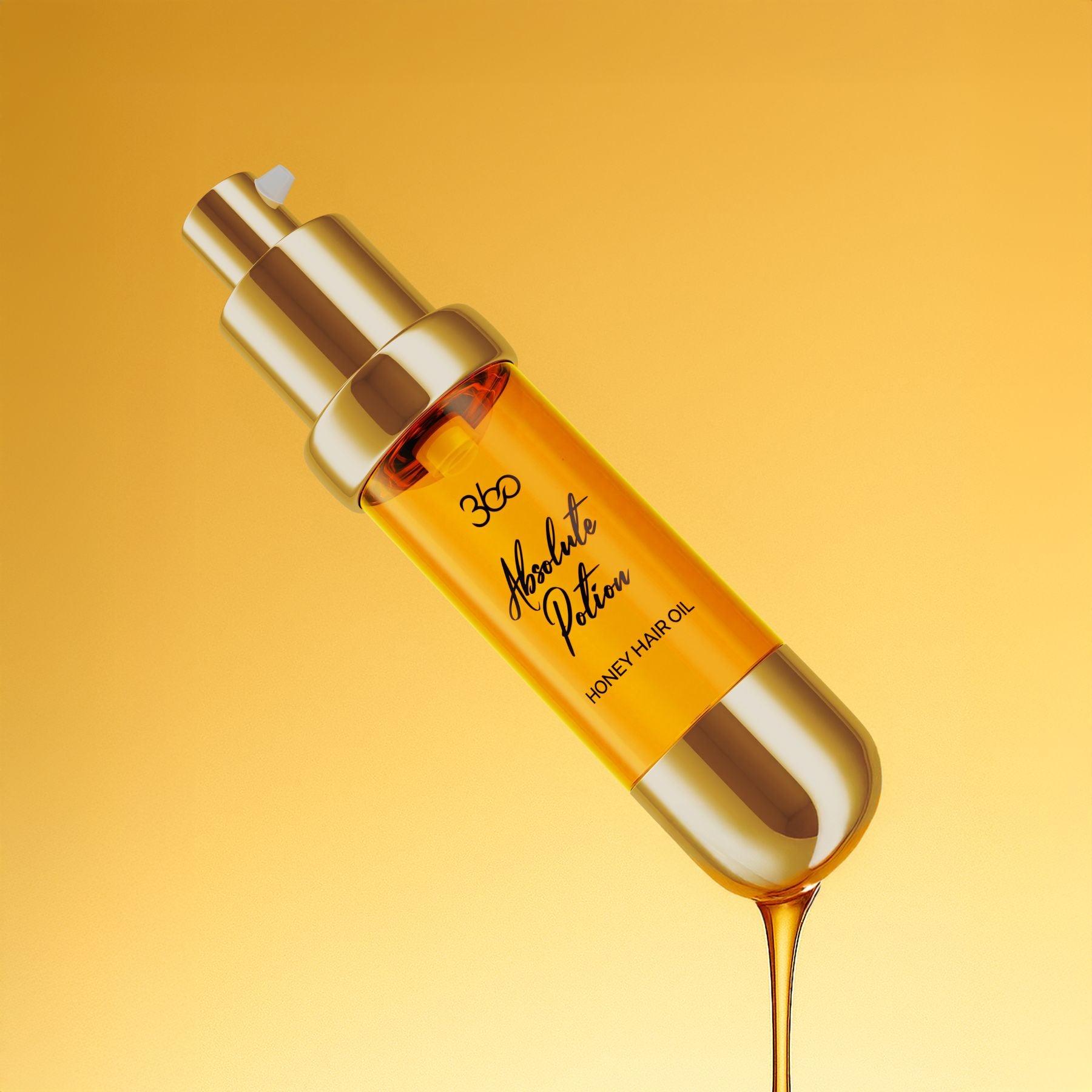 Honey hair oil dropper bottle with gold cap on a yellow background